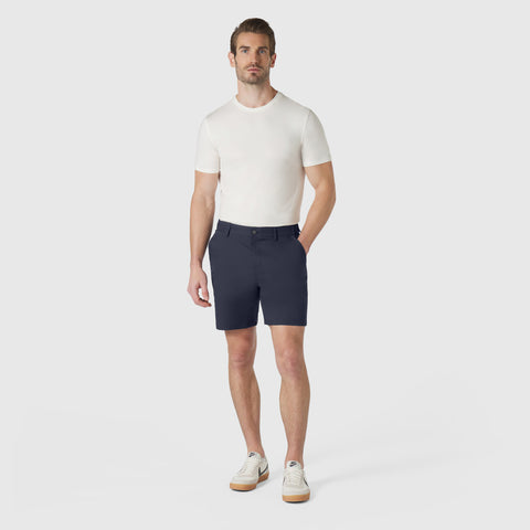 Man wearing navy Jetsetter Tech Shorts, part of a 3-pack designed for durability and consistent fit.