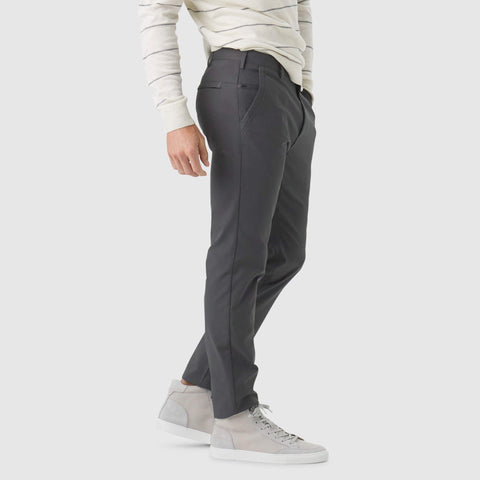 Jetsetter Tech Pant Slim Fit in dark color, showcasing slim fit design and reflective details.