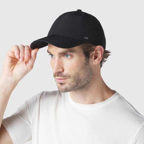 Black Anytime Hat with adjustable velcro strap for a perfect fit.