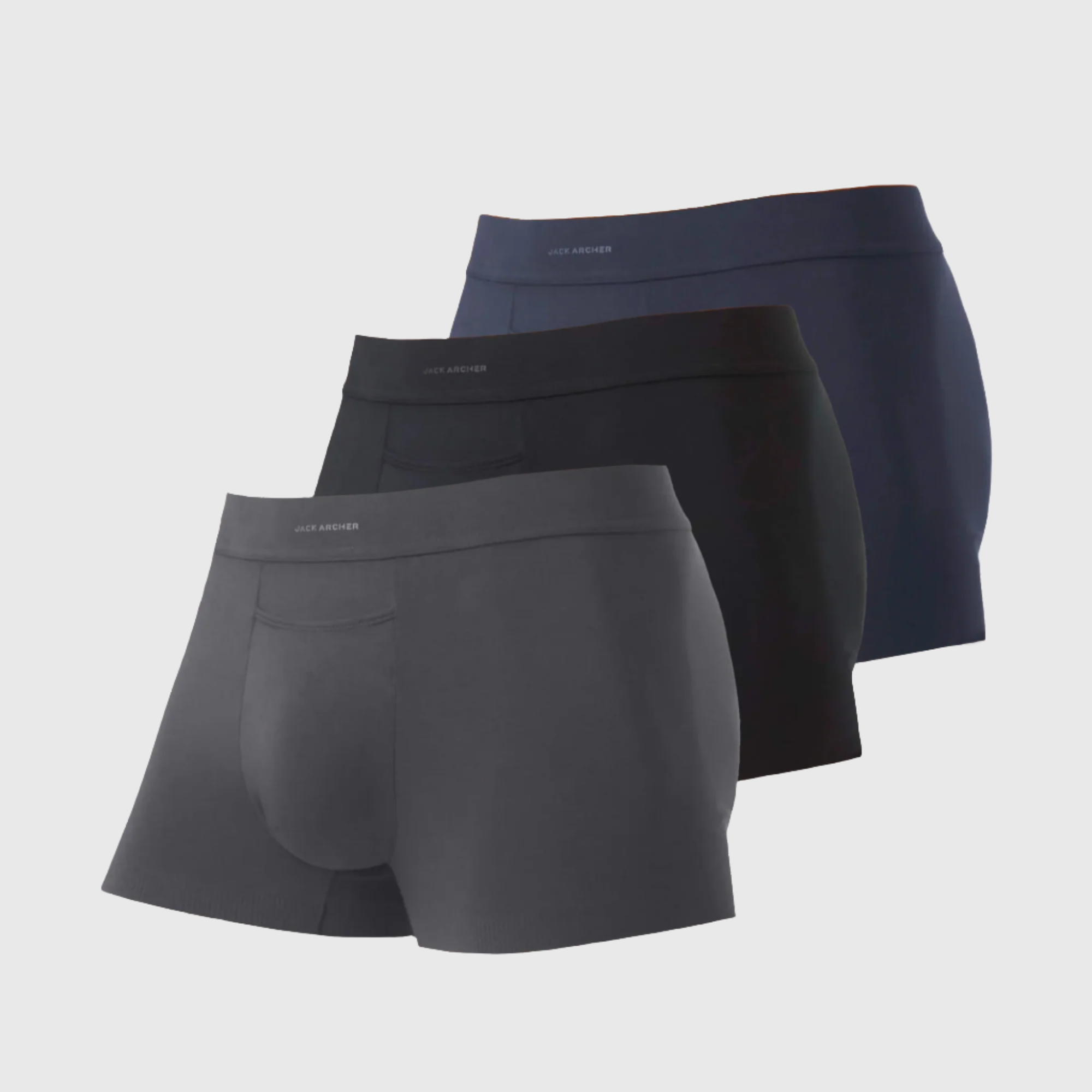 Black men’s boxer briefs on a plain background.