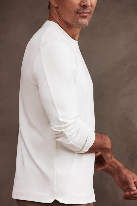 Precision Long Sleeve Tee in white, made from organic cotton, showcasing comfortable fit and wrinkle-resistant design.