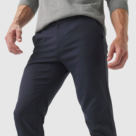 Jetsetter Tech Pant Slim Fit in black, showcasing wrinkle-free fabric and premium stitch details.