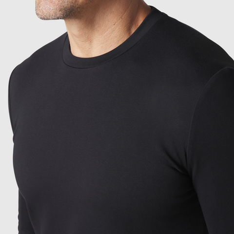 Precision Long Sleeve Tee made from soft organic cotton, emphasizing shoulders, in black.