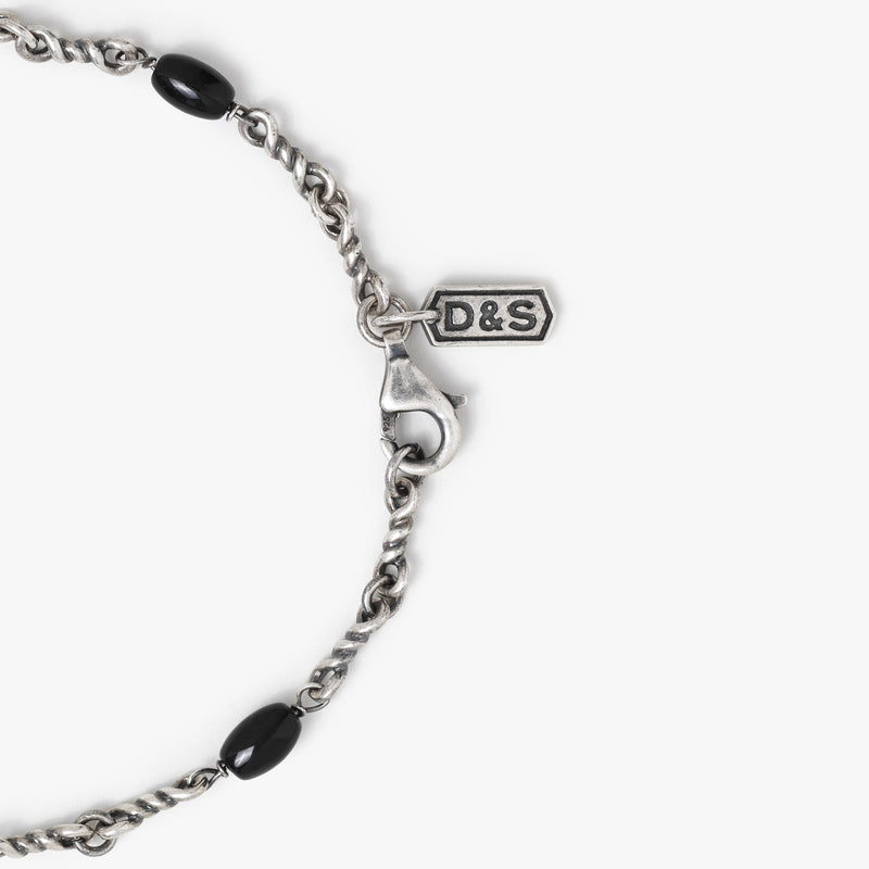 ["Sterling Silver Black Onyx Twisted Cable Chain Bracelet"]