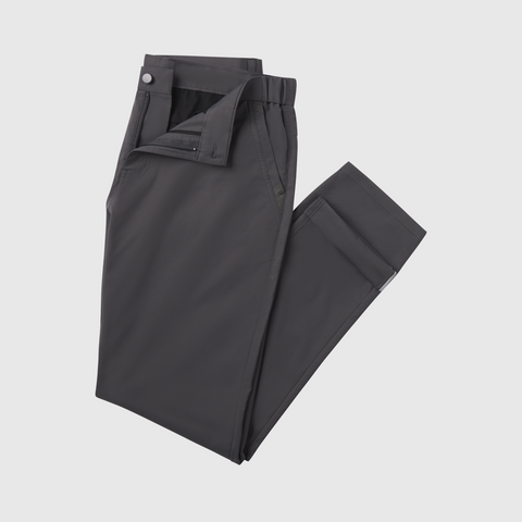 Jetsetter Tech Pant Straight Fit in dark color, wrinkle-free and travel-friendly.