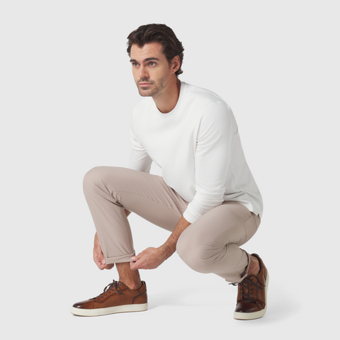 Slim fit Jetsetter Tech Pant in beige, featuring wrinkle-free microfiber fabric.