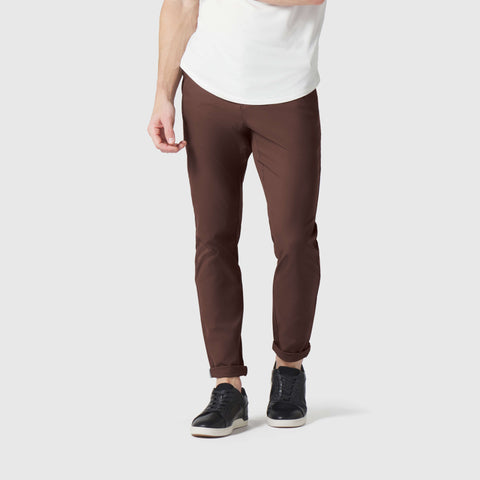 Jetsetter Tech Pant Slim Fit in brown, showcasing slim design and comfortable fit, ideal for travel with wrinkle-free and stain-repellent features.