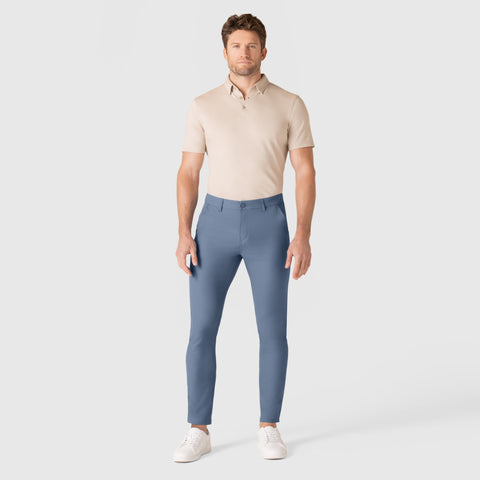 Slim fit Jetsetter Tech Pant featuring wrinkle-free, anti-odor, stain repellent microfiber fabric; ideal for travel and versatile wear.