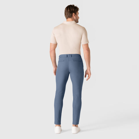 Slim fit Jetsetter Tech Pant in blue, featuring anti-odor, wrinkle-free microfiber fabric, perfect for travel.