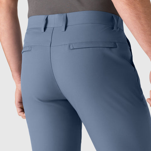 Slim fit Jetsetter Tech Pant showcasing wrinkle-free, stain-repellent microfiber fabric with a curved waist for butt-lifting effect.