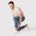 Slim fit blue Jetsetter Tech Pant with wrinkle-free, stain-repellent, and travel-friendly features.