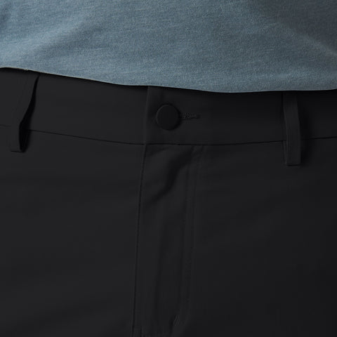 Slim fit Jetsetter Tech Pant with microfiber fabric, anti-odor, wrinkle-free, and stain repellent features for travel-friendly comfort.