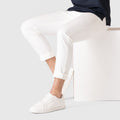 Slim fit white Jetsetter Tech Pant with travel-friendly features.