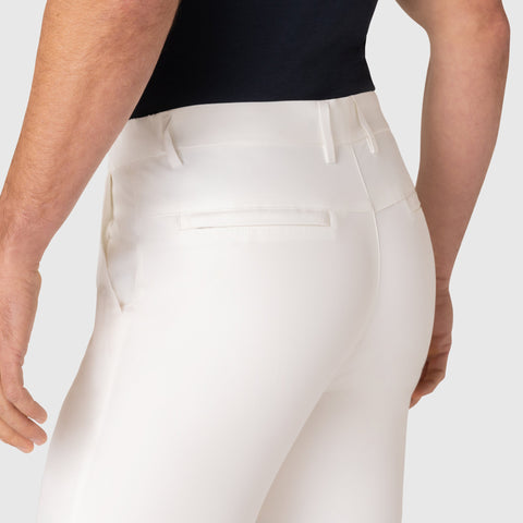 Slim fit Jetsetter Tech Pant in white, featuring wrinkle-free and anti-odor technology for travel comfort.