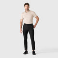 Jetsetter Tech Pant Slim Fit worn by model, displaying versatile travel-friendly design.