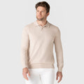 Refined beige Legacy Polo Sweater in premium viscose blend worn by model.