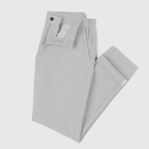 Jetsetter Tech Pant Slim Fit in light gray, featuring travel-friendly design and wrinkle-free material.