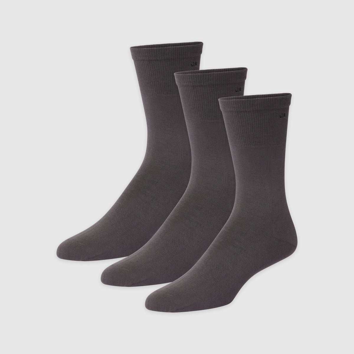 Three pairs of plain black socks displayed on a white background.