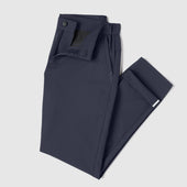 Jetsetter Tech Pant Slim Fit in navy, wrinkle-free and travel-friendly.