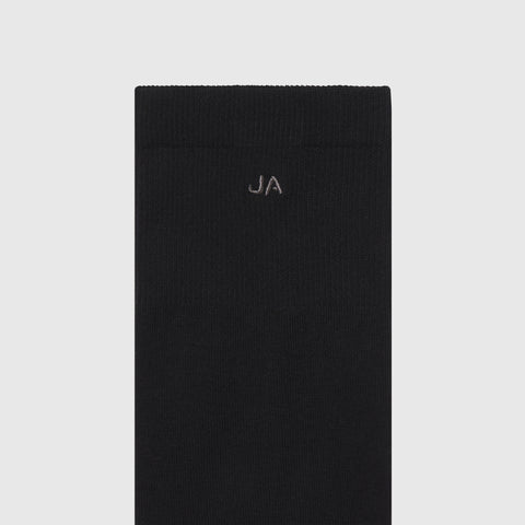 Black Anytime Socks made from premium Pima cotton, offering softness, durability, and breathability.