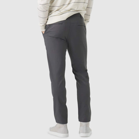 Jetsetter Tech Pant Slim Fit in dark gray, showcasing wrinkle-free and travel-friendly features.