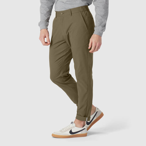 Jetsetter Tech Pant Slim Fit in olive green, featuring slim fit design with travel-friendly and wrinkle-free microfiber fabric.